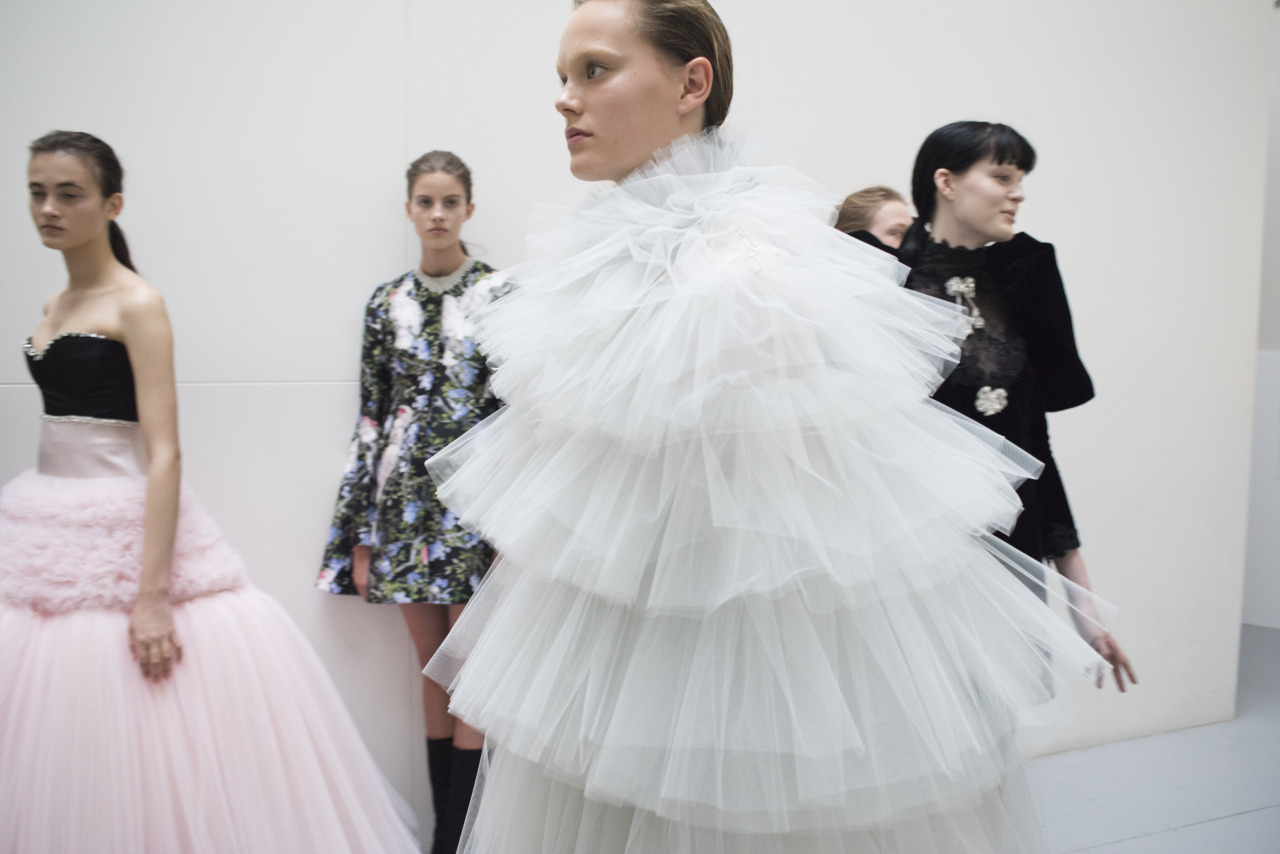 Giambattista Valli's Paris atelier with a draped couture muslin on the mannequin in the foreground