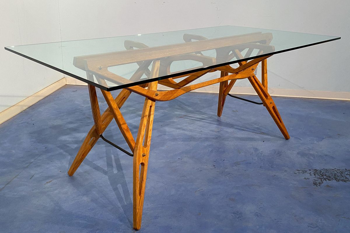 Carlo Mollino furniture from the Fondo Carlo Mollino at the Politecnico di Torino, now being reissued by Zanotta in 2026 under an Agenzia del Demanio licence covering 30 designs including the Vertebra and Reale tables.